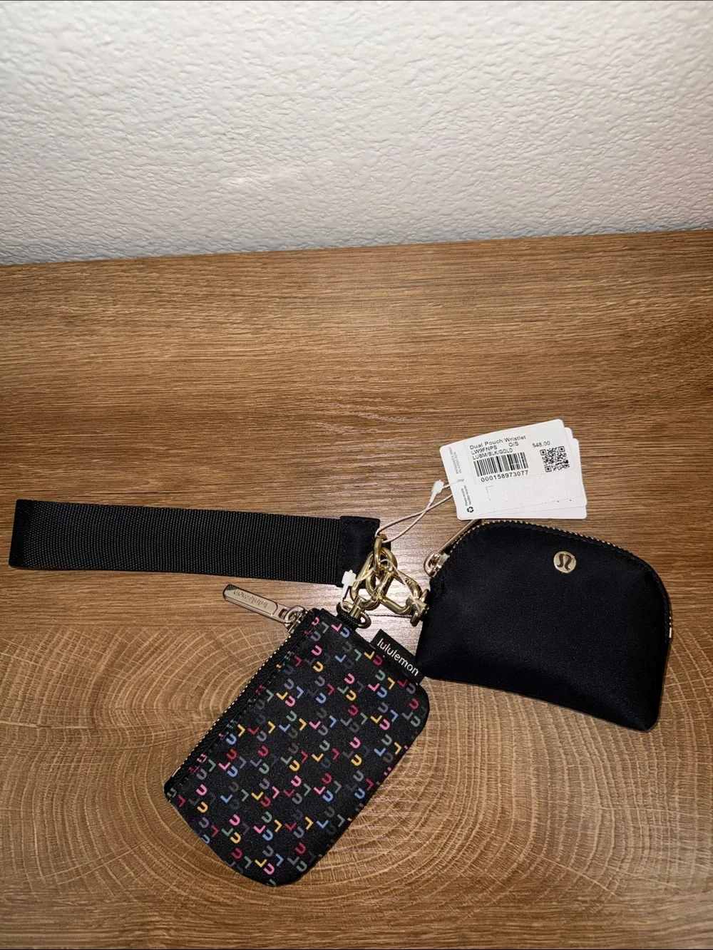 lululemon athletica Black Wristlet with Multicolor 'C' Print
